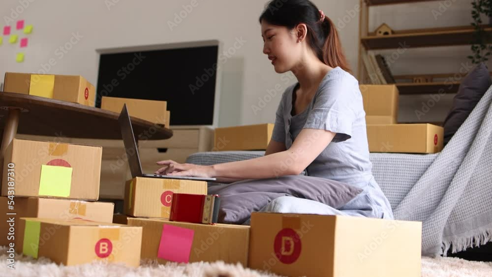 young businesswoman using laptop computer online chat with packaging box, Business online influencer on social media concept, Online Selling, Online Shopping to market. young businesswoman using laptop computer online chat with packaging box, Business online influencer on social media concept, Online Selling, Online Shopping to market.