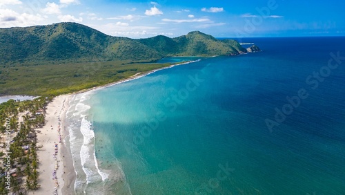 Aerial view of the beautiful sunny Bahia de Patanemo beach in Puerto Cabello, Venezuela