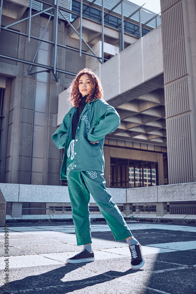 Urban, fashion and woman with street clothes for travel, lifestyle and comfort in the city of Seoul for holiday. Young, stylish and portrait of a young trendy fashion model with designer clothing