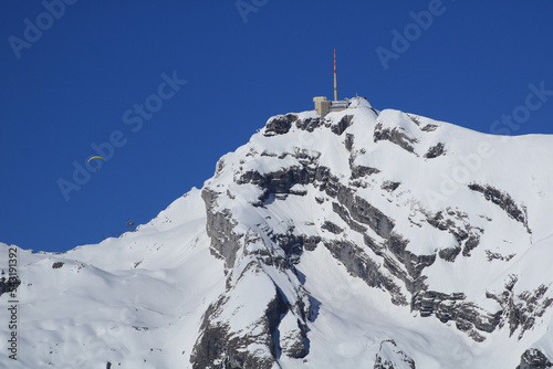 Peak and summit station of Mount Saentis in winter. photo