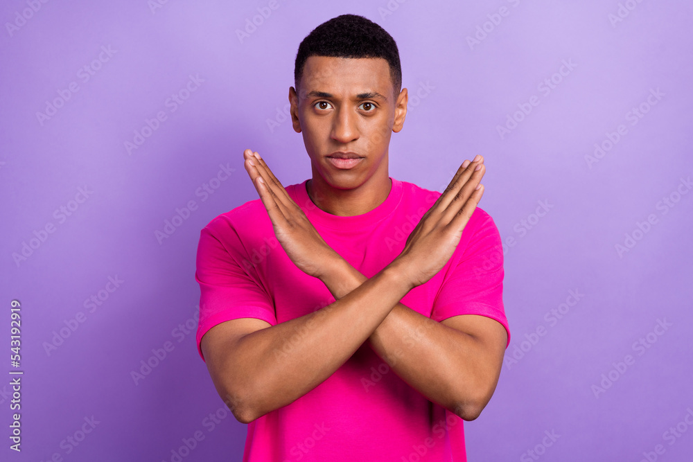 Portrait photo of young strict man student wear t-shirt showing arms ...