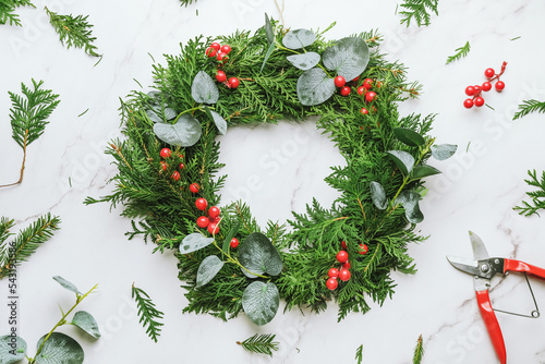 Obraz na plátně Christmas wreath. DIY winter home decor idea.