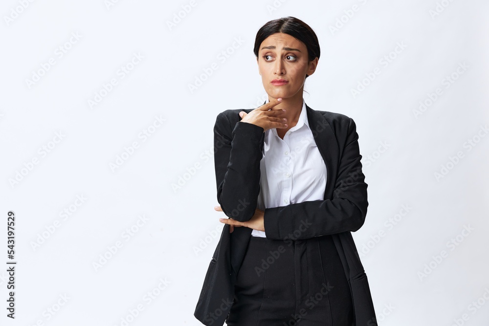 Business woman in black business suit shows signals gestures and emotions on white background, freelancer job online time management, teacher science