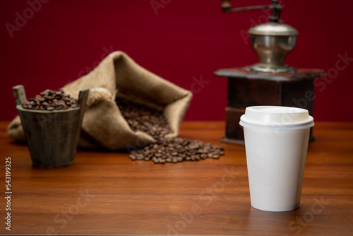 Take away coffee with coffee grinder and coffee beans