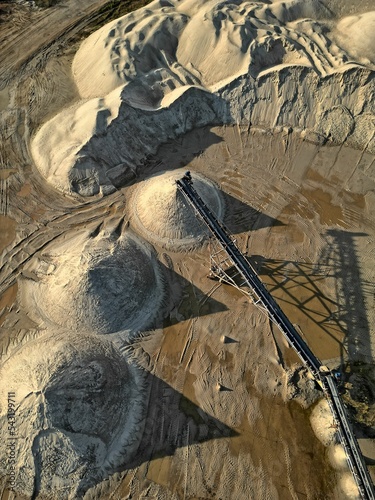 Obraz na płótnie open pit mine and selection of raw materials and minerals extracted from the ground w salonie