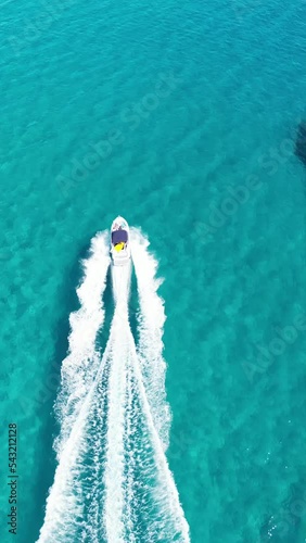 drone boat chasing on tropical sea