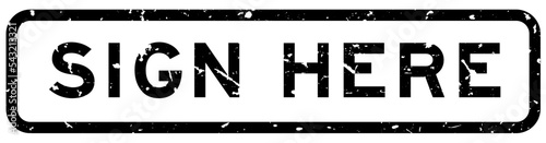 Grunge black sign here word square rubber seal stamp on white background