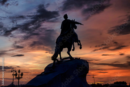 Bronze horseman monument on Neva river embankment at sunset background. Unique urban landscape of St Petersburg. Central historical top tourist places in Russian, Capital Russian Empire. Copy space