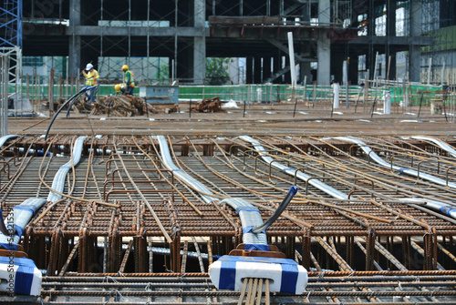 
MALACCA, MALAYSIA -APRIL 14, 2016: Pre-stress cable tendons for prestressed concrete at the construction site. It is a technology to get better concrete slab quality with larger span. 
