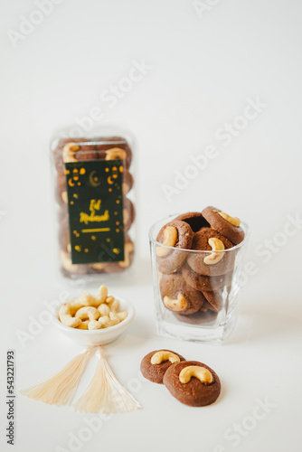 Ramadhan Hampers moslem theme for celebrate the holy, bake snack, nastar, bakery, cookies, choco chips, roll cake, castangel, on white background photo