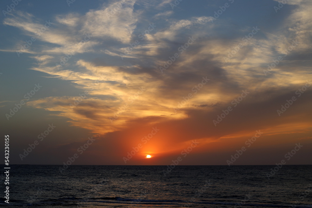The sun sets below the horizon on the Mediterranean Sea in northern Israel.