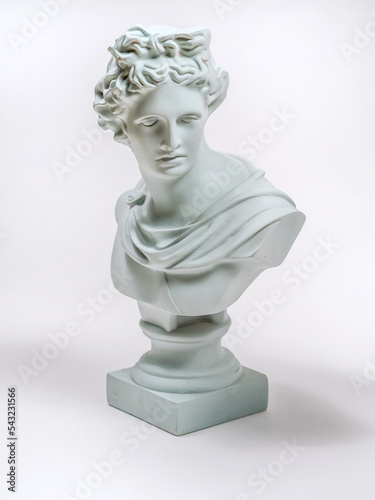 Head of gypsum statue of Apollo Belvedere isolated on a white background. Antique statue.