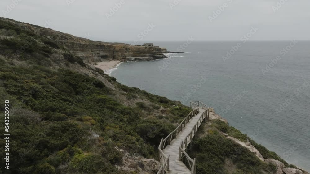 Aerial shot of a stairway leading to the ocean Ericeria Portugal Aerial shot of a stairway leading to the ocean Ericeria Portugal