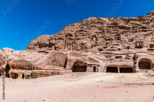 A view from the main thgoroughfare towards the Royal Tombs in the ancient city of Petra, Jordan in summertime
