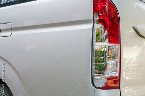 The red and white brake lights and reversing lights of the transport van were broken due to a collision.accident and insurance concept