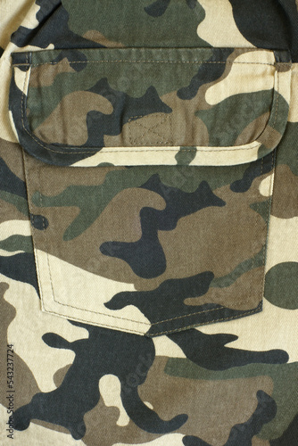 Close-up of pocket on camouflage pants