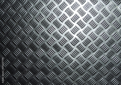 Stainless steel plate surface and anti-slip pattern.
Glossy metallic finish pattern and reflected white light.