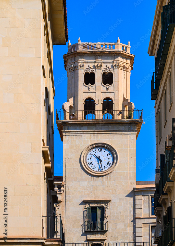 Medieval clock tower in the town hall building or government building in the old town of Alicante, Spain