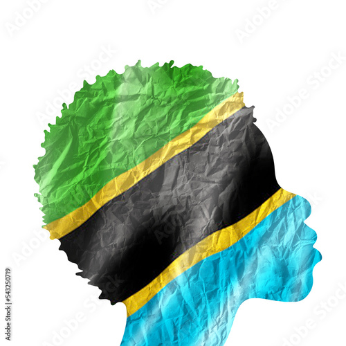 African woman silhouette with Tanzania national flag. photo