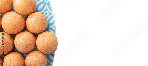 Fritters on the blue plate isolated on white background