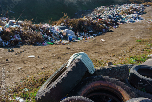 Canvas Print Illegal garbage dump in nature, dirty enviroment garbage near village