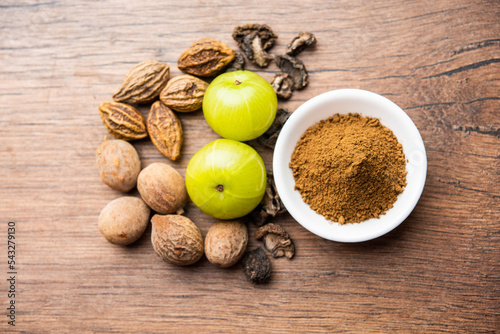 Ayurvedic Triphala churan or trifala powder is an ancient medicine for bowel movement, indigestion photo