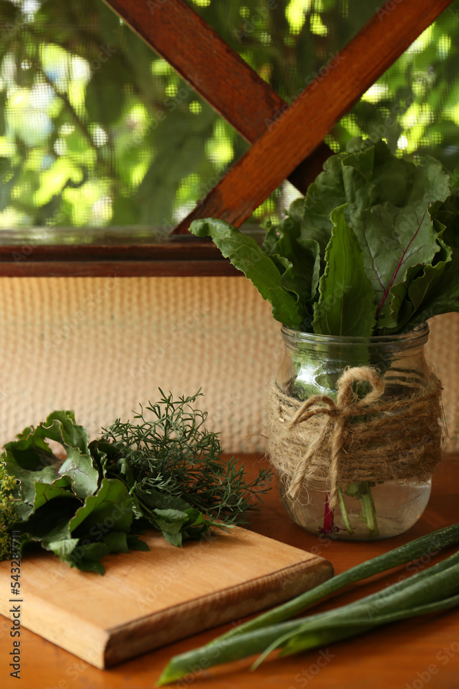 Fototapeta premium Different fresh green herbs on window sill indoors