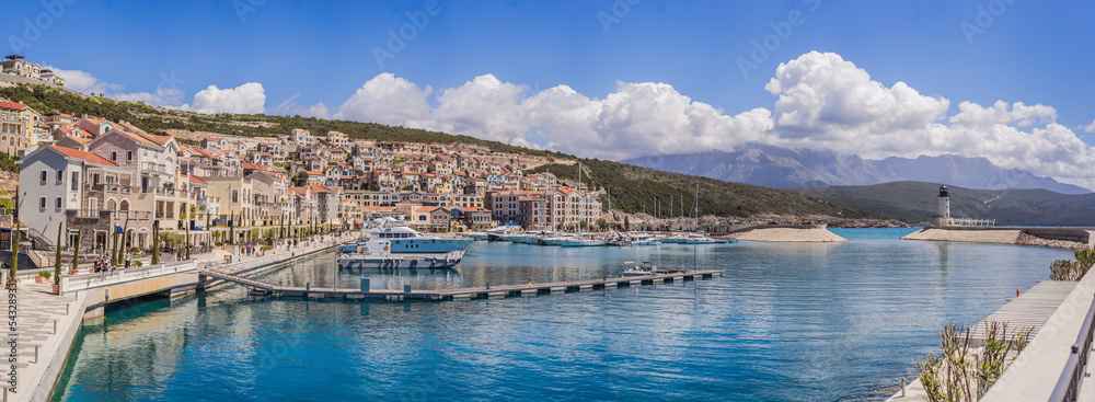 Fototapeta premium Architecture and luxury yachts in Lustica Bay, Montenegro. Travel around Montenegro concept. Go Everywhere