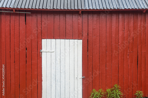 the door of a fisherman's hut on the island of seja in norway photo