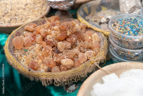 Frankincense, incense, aromatic herbs and spices on street market in Petra (Red Rose City), Jordan photo