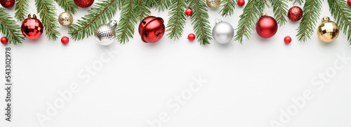 Christmas web banner with tree branches, decorations and ornations. Copy space for text.