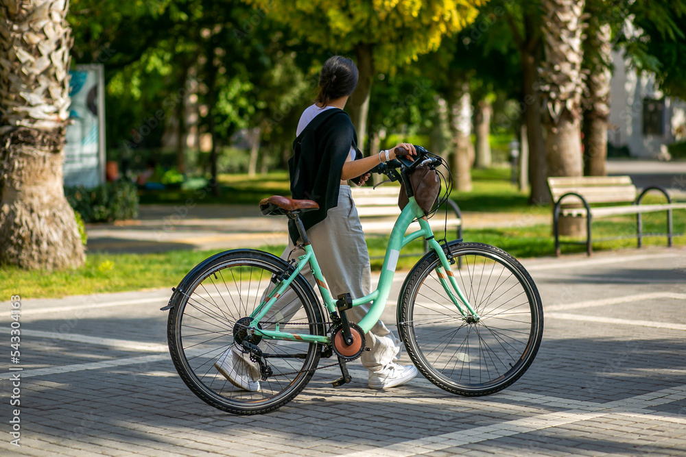 Fototapeta premium a woman on a bicycle