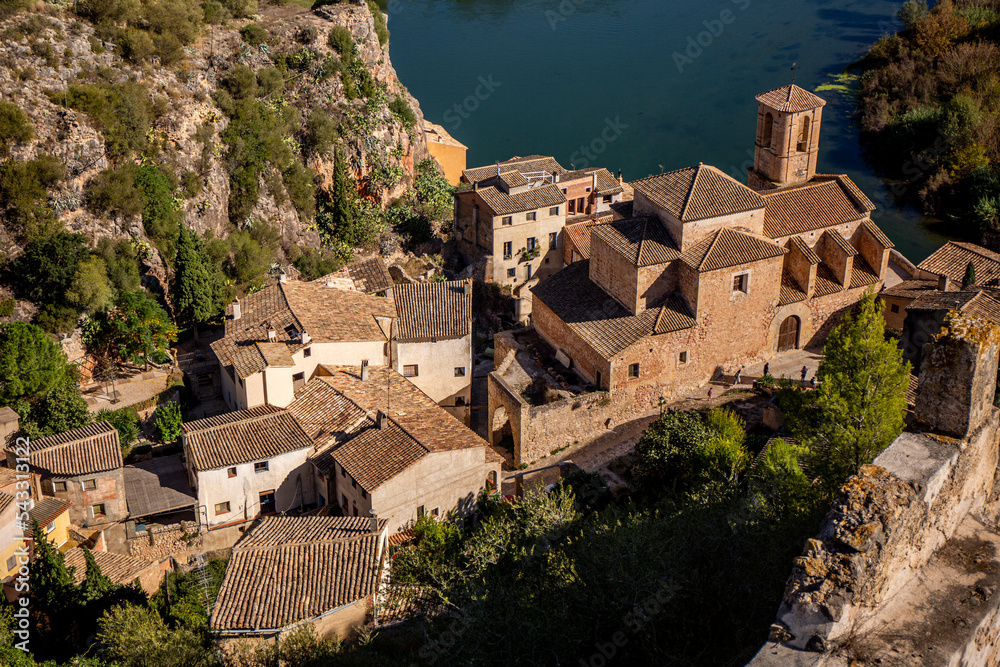 Aerial view of the medieval town of Miravet along the Ebro river in Catalonia, Tarragona province in Spain.
