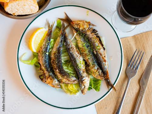 Healthy Mediterranean of fried sardines in batter served in a dish