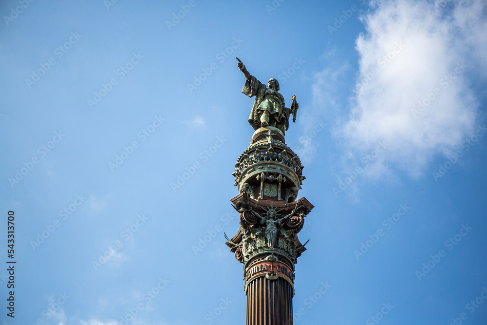 Columbus sculpture against the sky, city of barcelona, statue of columbus, end of las ramblas de catalunya, towards the sea.
