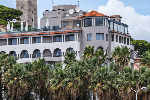 Suquet hill with The Castre Castle (Chateau de la Castre, built in 11th century) at the top which dominates the city and the bay of Cannes. Cannes, France. © dbrnjhrj