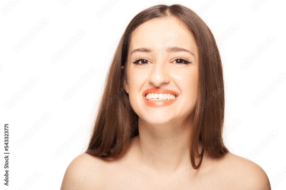 Beautiful girl close up studio portrait against white background. Beautiful girl close up studio portrait against white background.