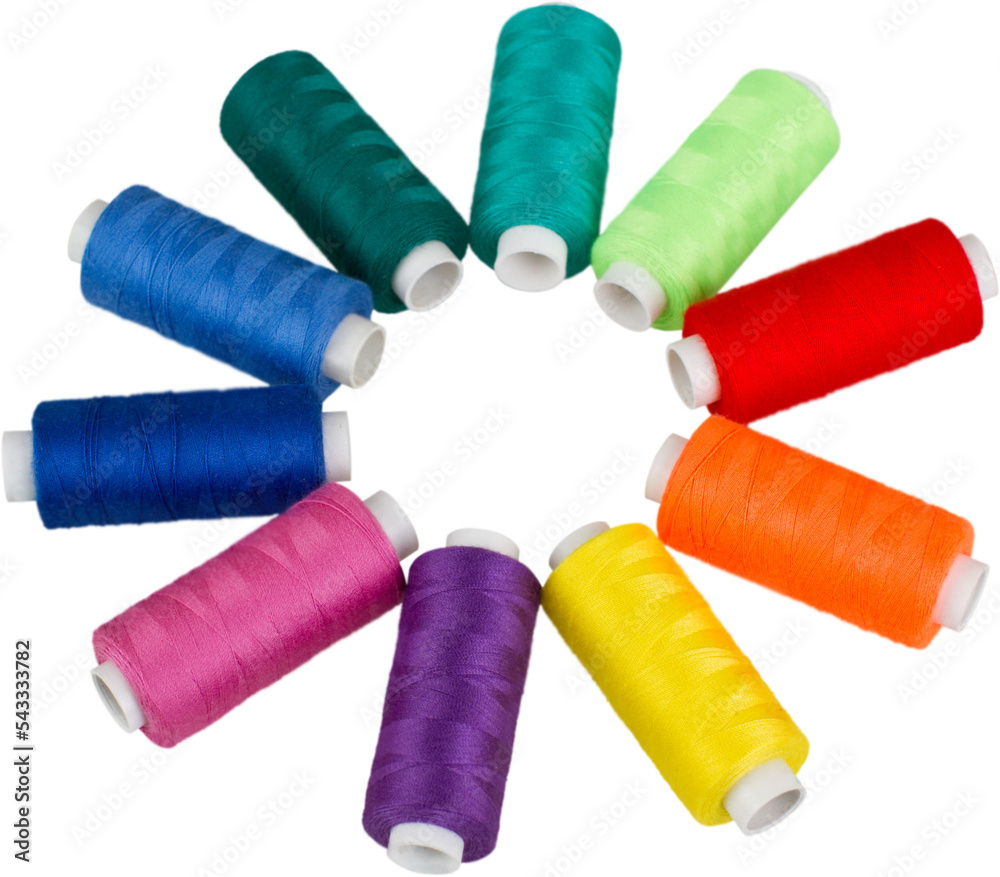 Spools of colorful thread isolated on white Spools of colorful thread isolated on white