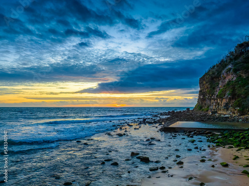 Sunrise seascape with clouds