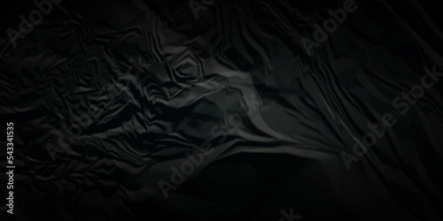 Dark black crumpled paper texture background. black crumpled and top view textures can be used for background of text or any contents.