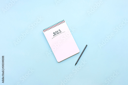 Obraz na płótnie Top view of empty notebook ready for New 2023 Year planing or wish list w salonie
