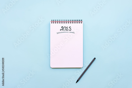 Obraz na płótnie Top view of empty notebook ready for New 2023 Year planing or wish list w salonie