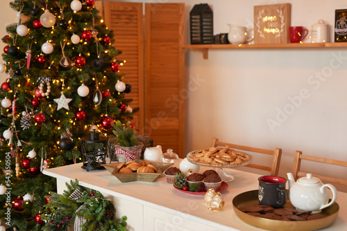 Kitchen christmas decor. Furniture and utensils. Christmas treat. New Year celebration. Winter holidays and vacations. Festive table