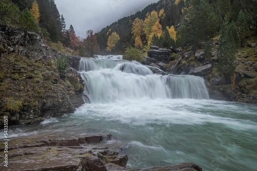 Cascada Gradas de Soaso in Arazas river in Ordesa y Monte Perdido National Park in Huesca, Spain photo