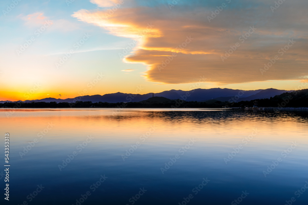 Beautiful lake and mountain with colorful clouds natural scenery at sunset