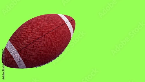 American football  Rotating in Motion on Green Screen. Looped American football  3d Animation