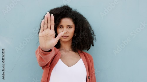 Black woman portrait, stop hands palm sign and fighting racism, oppression and inequality. Young african person, woke about discrimination and harassment warning, feminism and protest vote for no ban photo