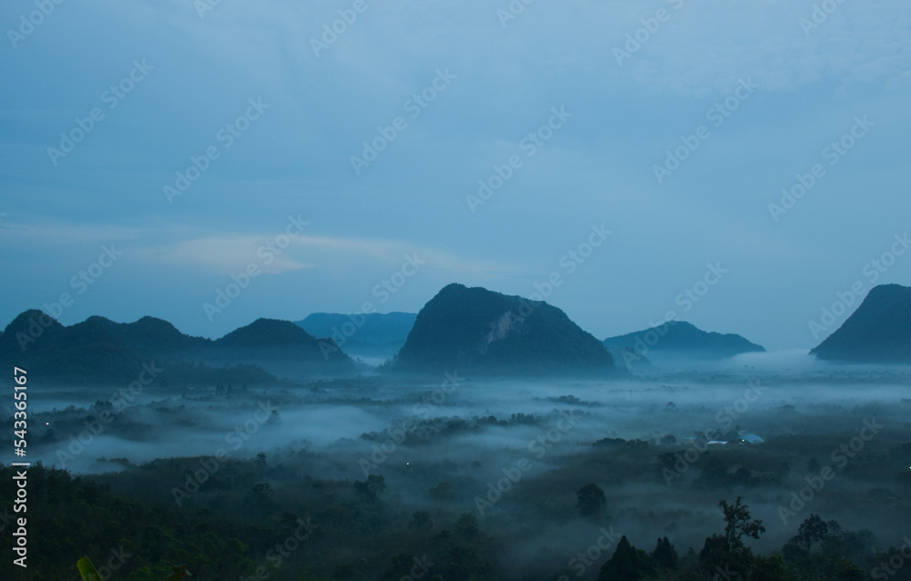 Early morning mist and beautiful mountain in south Thailand