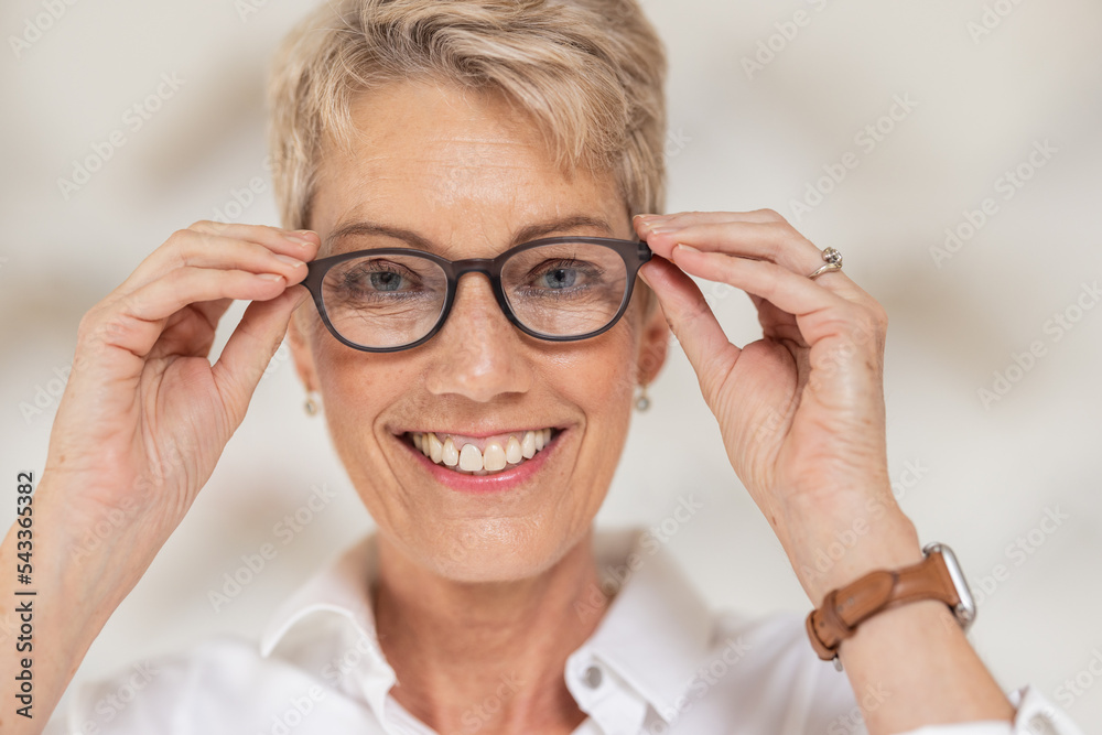 Mature woman, face and vision glasses in fashion or style eye care for healthcare insurance, medical wellness or glaucoma support. Smile portrait, happy person and optometry prescription eyes lenses