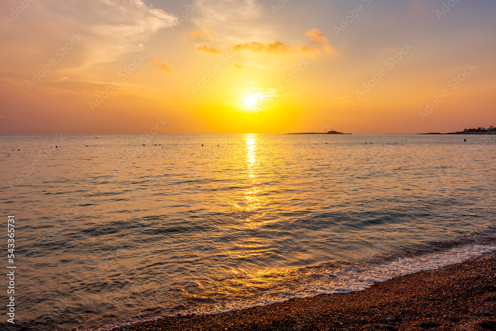 Scenic summer sunset on a beach